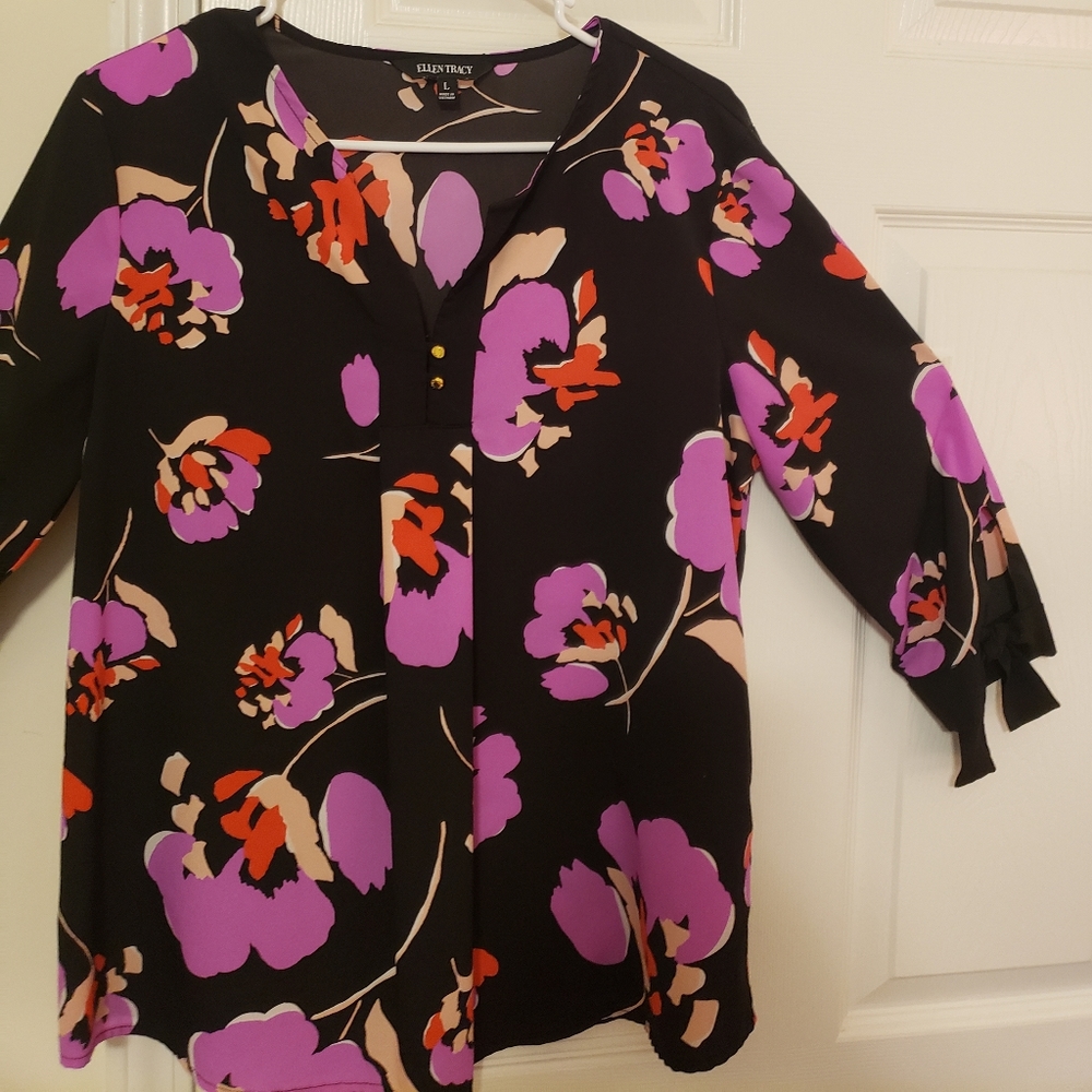 Three quarter sleeve light weight blouse.